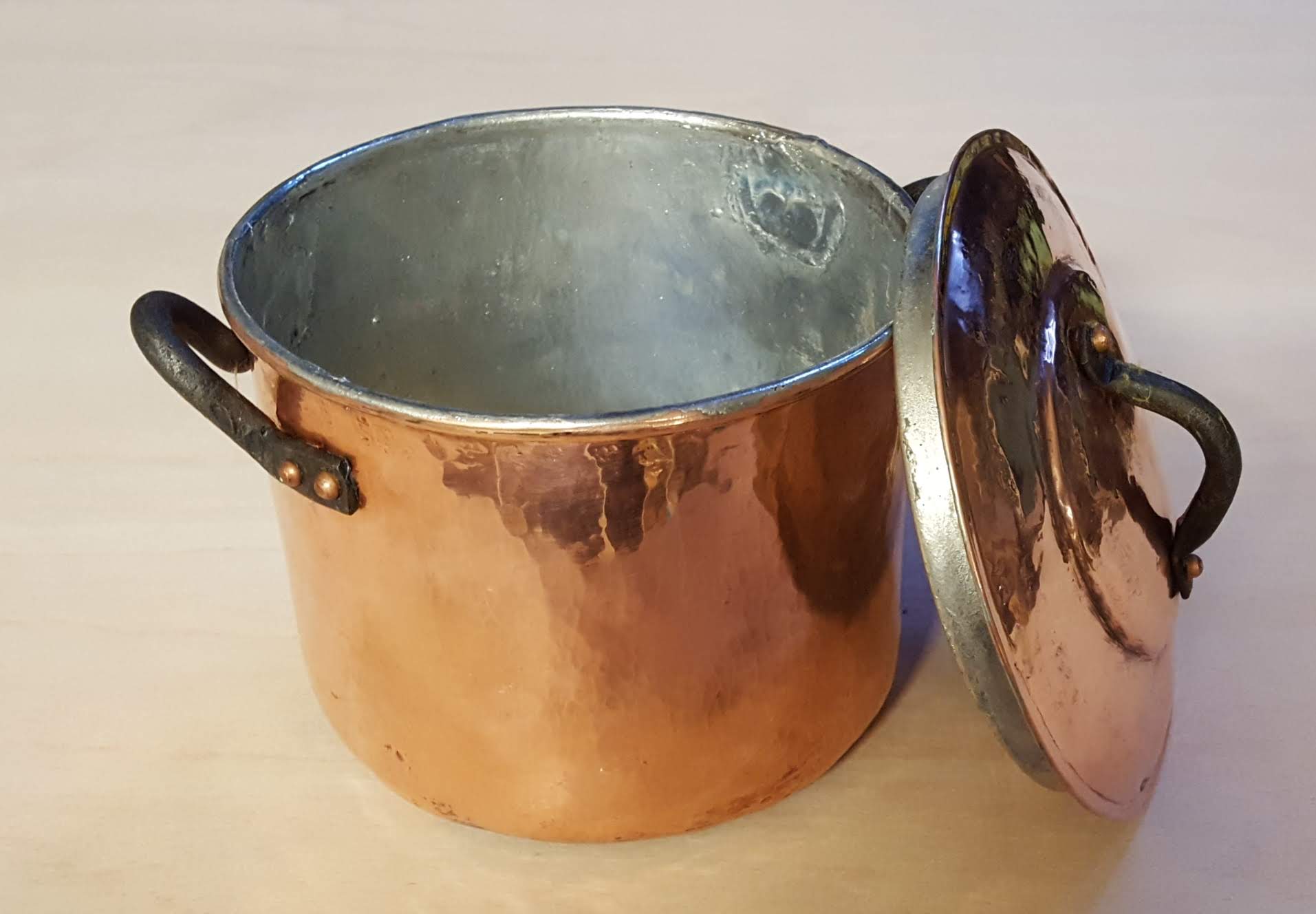 Copper pot with steel handles